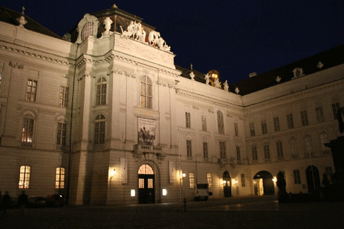photo (104KB) : The imposing exterior of the Austrian National Library by night and venue for the welcome reception of ECDL 2005